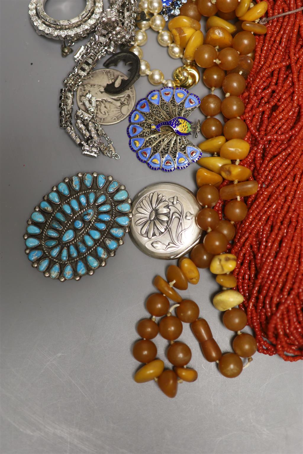 Two silver bangles, silver napkin ring, silver enamel peacock brooch and mixed costume jewellery